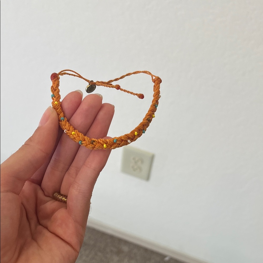 Pura Vida Orange Braided Bracelet with Yellow and Blue Accents